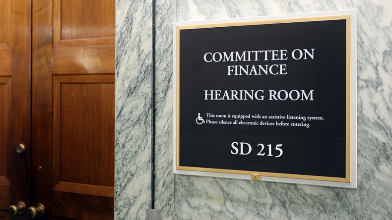 WASHINGTON - JULY 18: A sign at the entrance to a Senate Finance Committee hearing room in Washington, DC on July 18, 2017. The United States Senate is the upper chamber of the United States Congress.