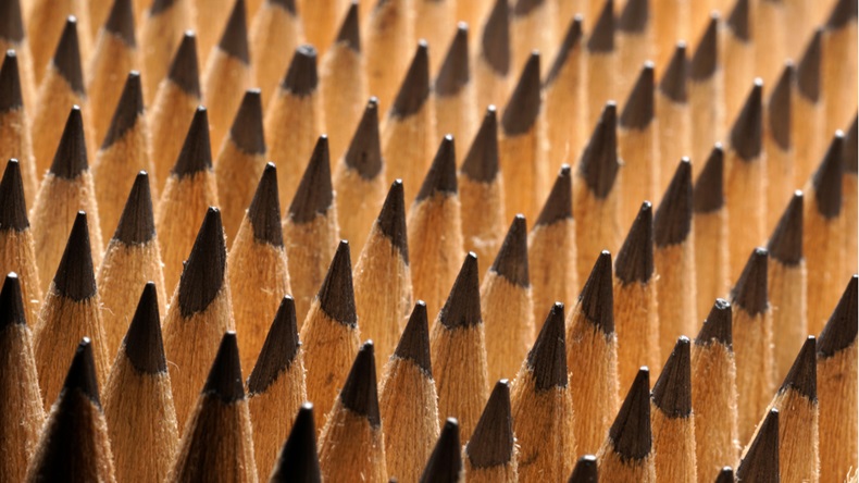 Close Up of bunch of identical sharp graphite pencils. Studio shot. Concept of uniformity. Concept of similarity. - Image 