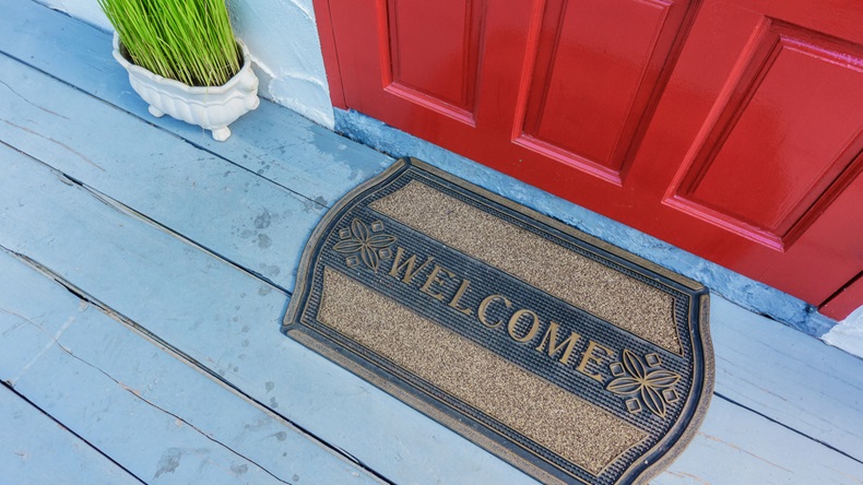 Welcome mat outside the front door - Image 