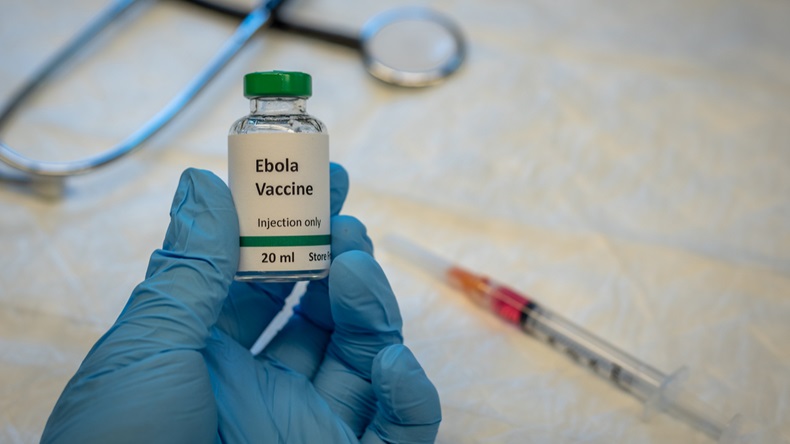 Fake ebola vaccine vial with syringe and stethoscope at the background - Image 