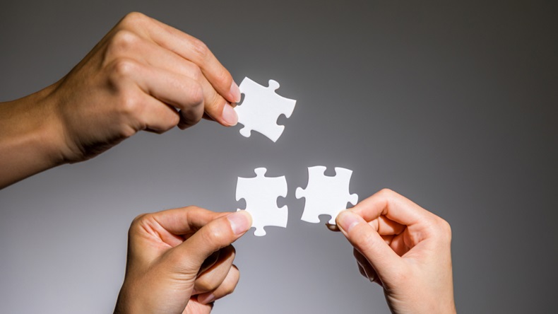  hands holding jigsaw puzzles, business to business, business matching concept