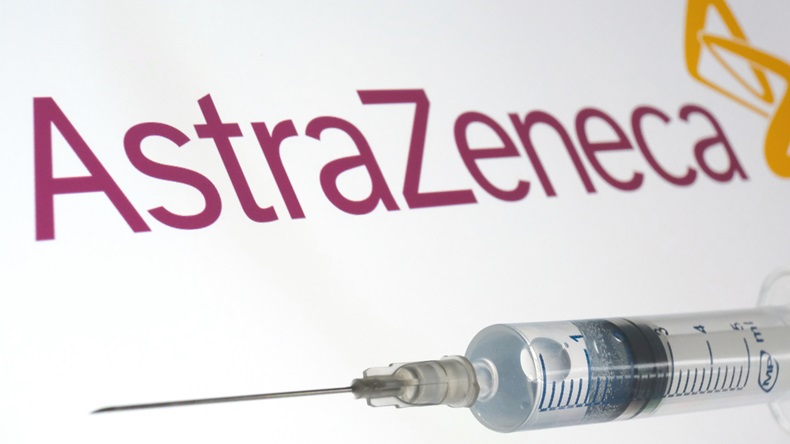 Stone / UK - September 9 2020: AstraZeneca vaccine also known as Oxford vaccine. Syringe and AstraZeneca logo on the blurred background. Selective focus. Concept.