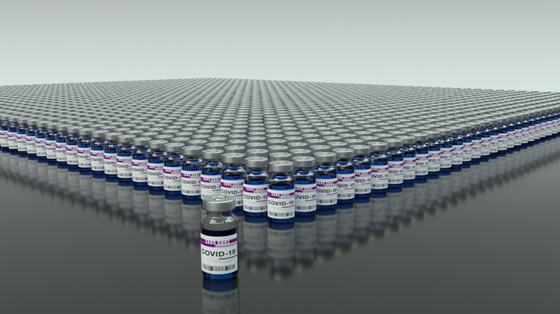 Lots of bottles with COVID-19 vaccine. A larger bottle is in the foreground. 3d illustration