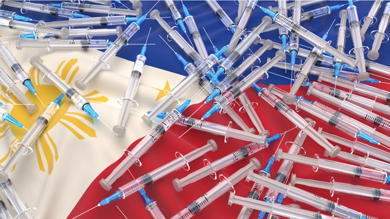 Coronavirus Vaccine and Syringe with needle on the Philippines Flag, Covid-19 infection, vaccine injection, 3D illustration