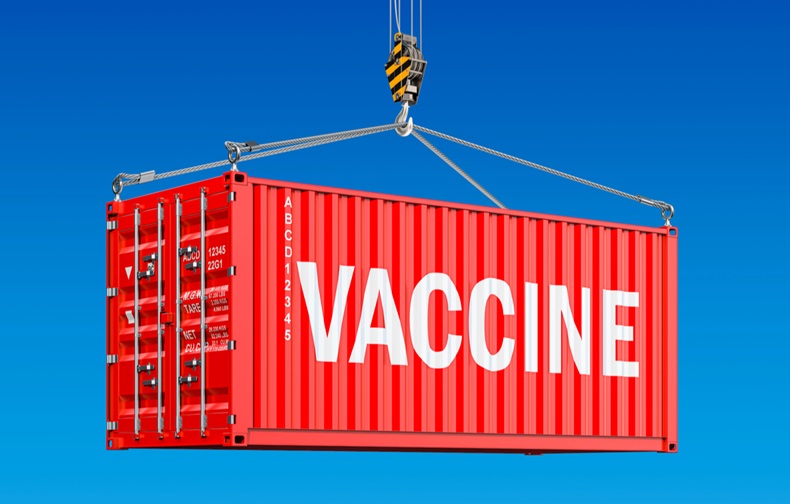 Vaccine shipping concept. Cargo container with vaccine hanging on the crane hook.