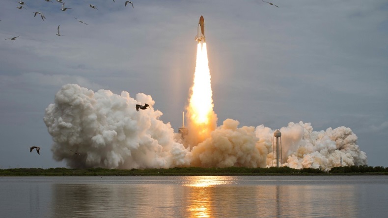 Space shuttle Atlantis lifts off from the Kennedy Space Center, Florida