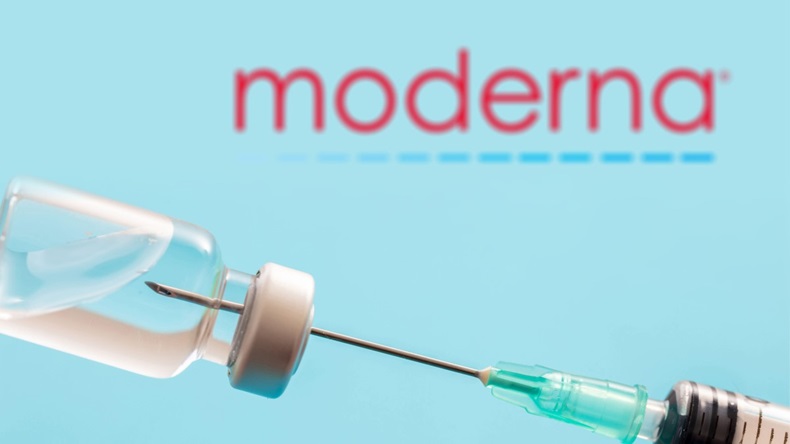 MODERNA logo on blue background. Covid19 vaccine vial and syringe