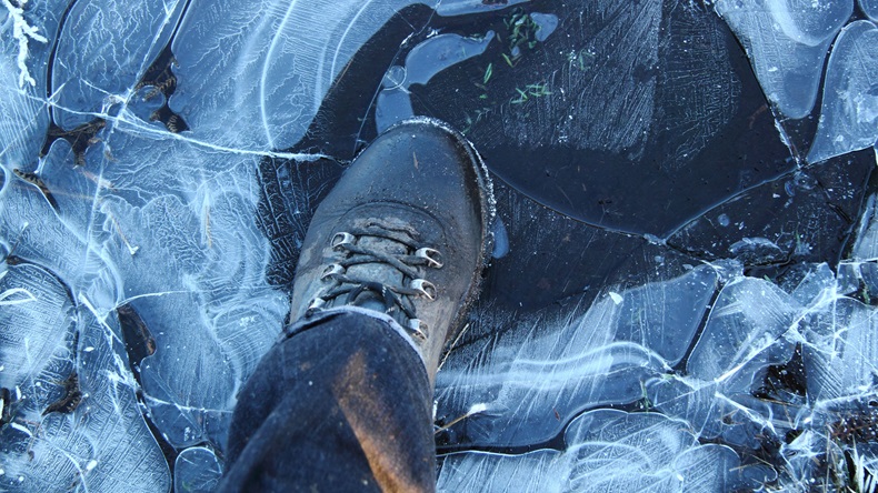 boot on thin breaking ice