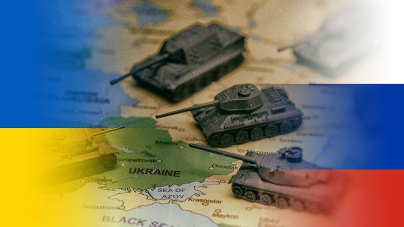 Conflict between Russia and Ukraine. Toy tanks on the map.