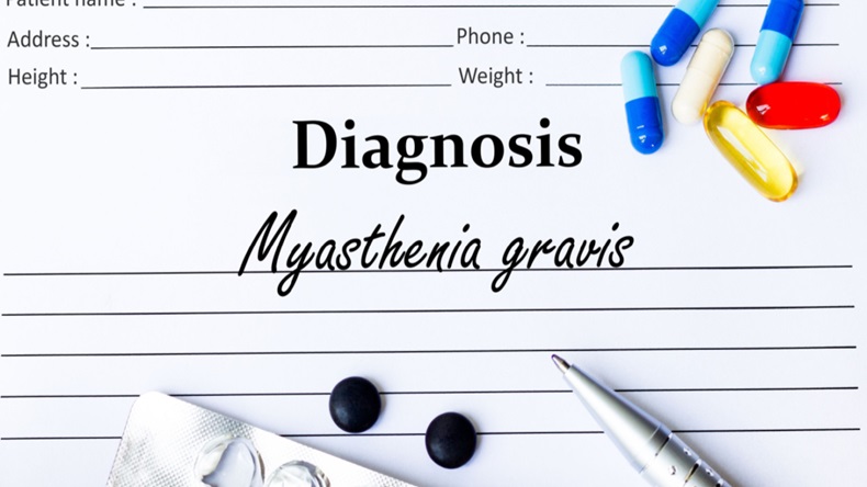 Myasthenia gravis - Diagnosis written on a piece of white paper with medication and Pills