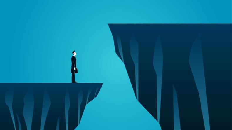 vector illustration of businessman standing on the edge of ravine thinking before making a decision. describe challenge, risk, obstacles, take a risk and danger.