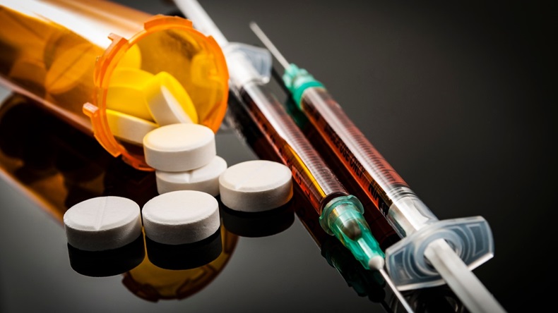 opioid pills and syringes