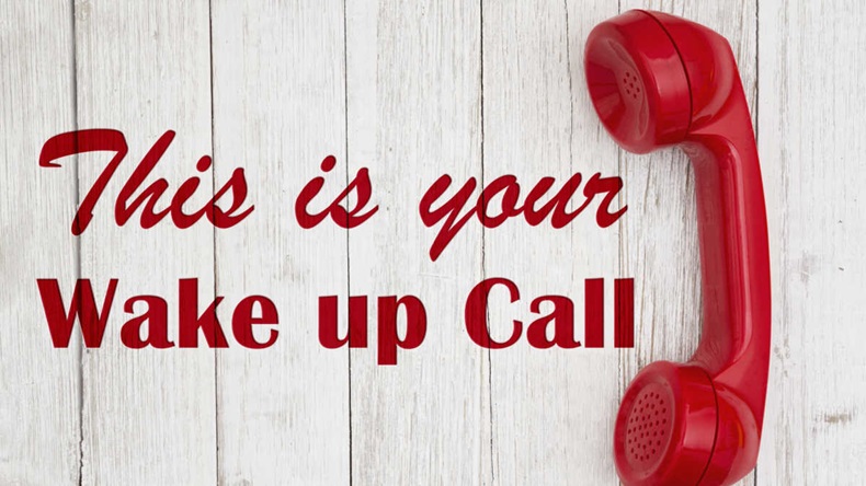 This is your wake up call text with retro red phone handset on weathered whitewash textured wood