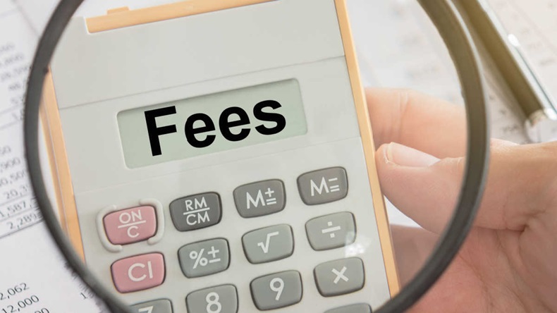 fees text displayed on calculator and magnifier.