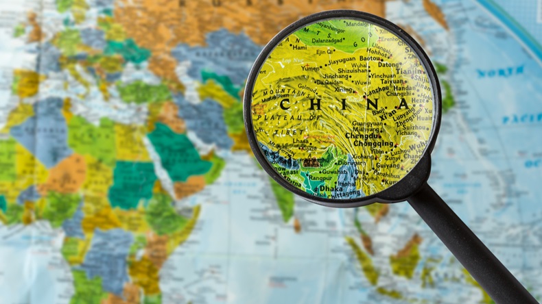Map of China in magnifying glass (shutterstock)