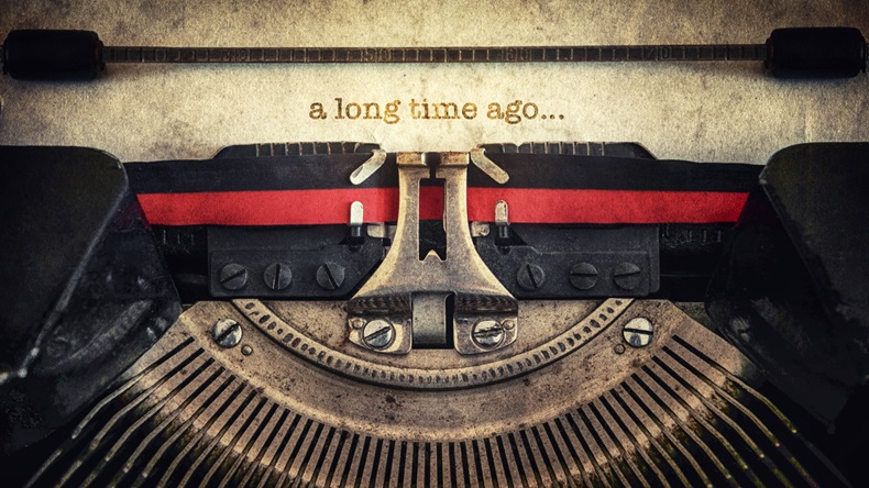 a long time ago on vintage typewriter (shutterstock)
