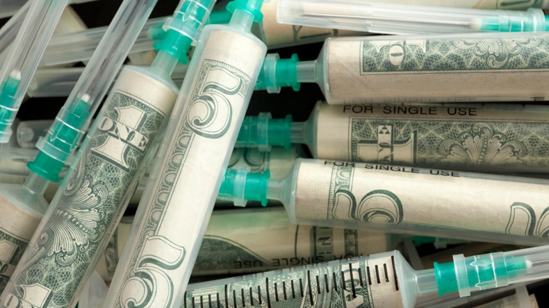 Syringes Filled With Dollars (Getty)