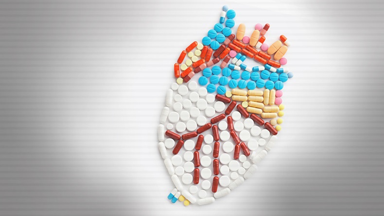 Drugs and pills in the shape of a human heart.